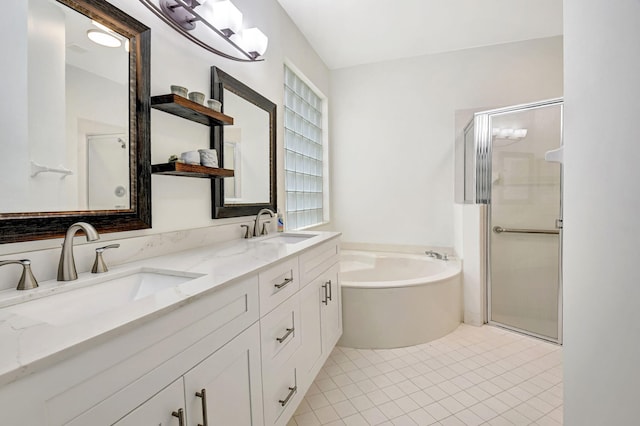 bathroom with a garden tub, a sink, and a shower stall