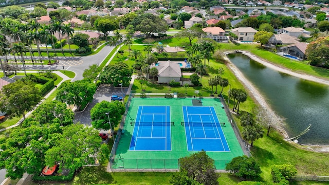 birds eye view of property featuring a water view and a residential view