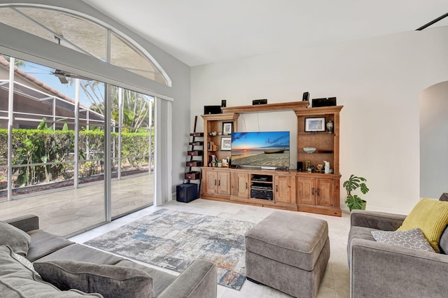 living area featuring arched walkways