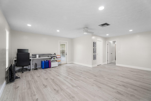 office featuring recessed lighting, visible vents, baseboards, and light wood finished floors