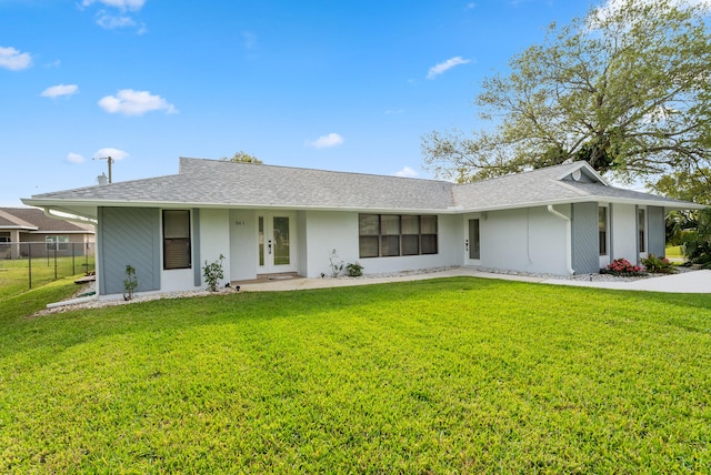 361 SW Carter Ave, Port Saint Lucie, FL 34983 - view of front of home with stucco siding and a shingled roof