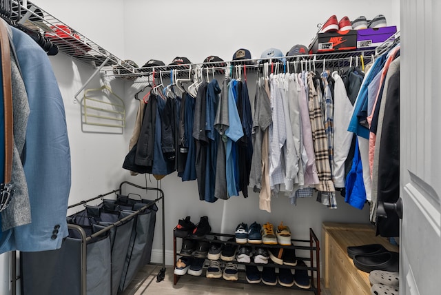 spacious closet featuring wood finished floors