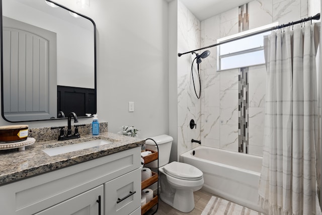 full bath featuring vanity, wood finished floors, toilet, and shower / bathtub combination with curtain