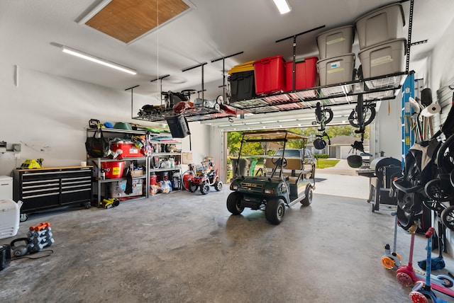 garage with a workshop area