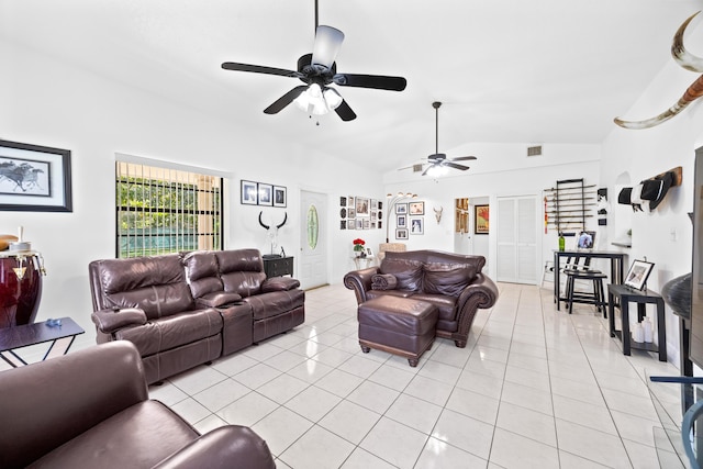 living room with light tile patterned floors, ceiling fan, visible vents, and vaulted ceiling