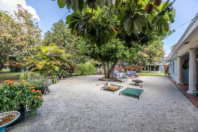 view of property's community featuring a patio