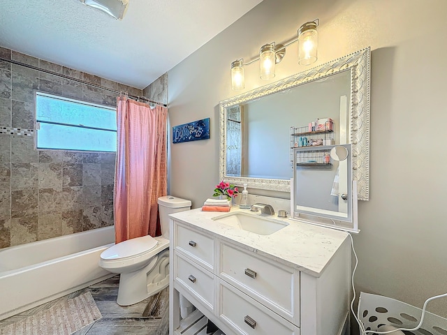 bathroom featuring shower / tub combo, vanity, and toilet