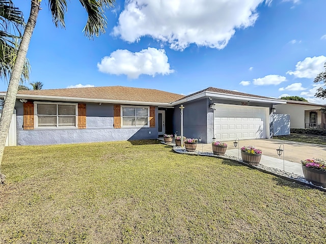 ranch-style house with concrete driveway, a front yard, an attached garage, and stucco siding