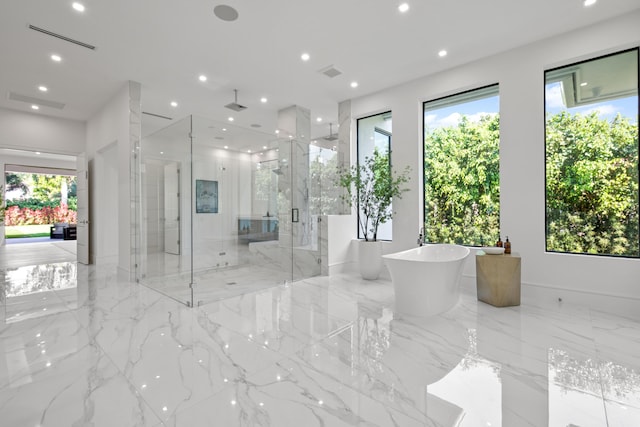 full bath with a freestanding tub, a shower stall, visible vents, and recessed lighting