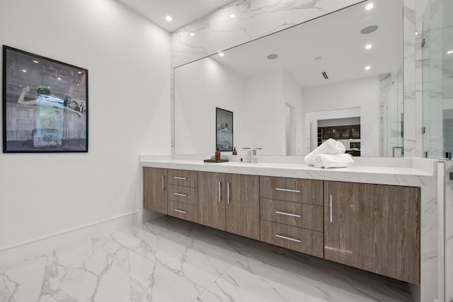 bathroom featuring a marble finish shower, baseboards, marble finish floor, vanity, and recessed lighting