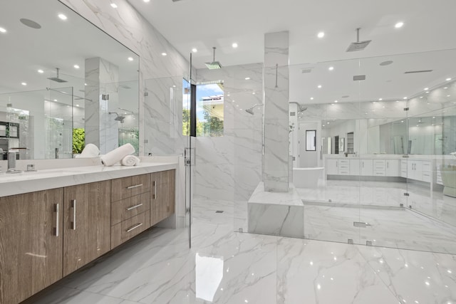 full bathroom featuring stone wall, a marble finish shower, and marble finish floor