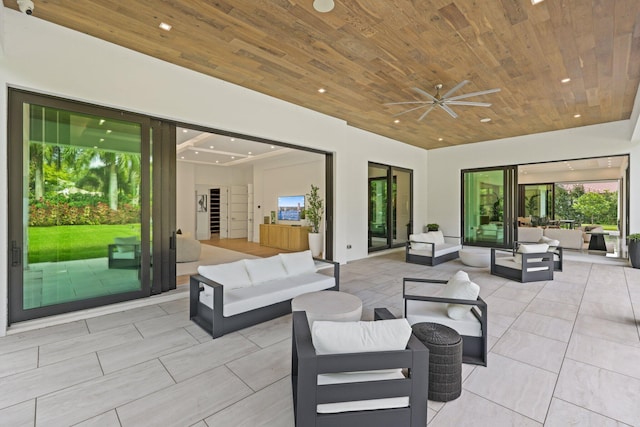 view of patio / terrace with outdoor lounge area and ceiling fan