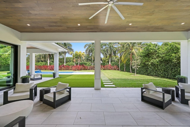 view of patio featuring ceiling fan, outdoor lounge area, and an outdoor pool