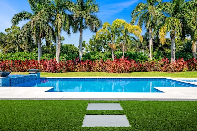 pool featuring a lawn