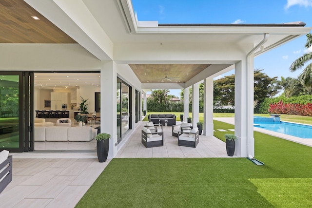 view of patio / terrace featuring an outdoor pool, an outdoor living space, and ceiling fan