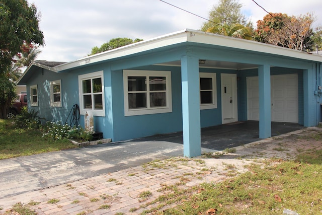 view of front of home featuring stucco siding