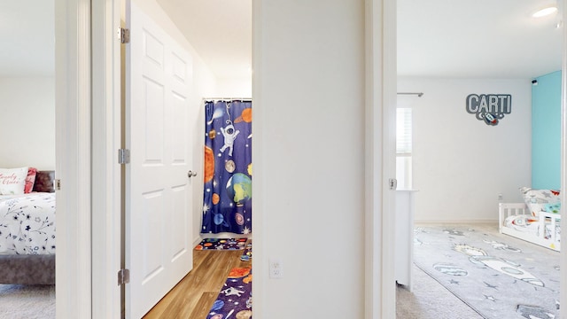 hall featuring light wood finished floors