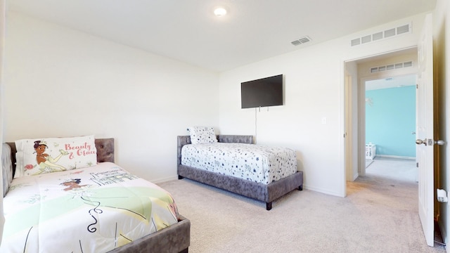 bedroom featuring carpet flooring, visible vents, and baseboards