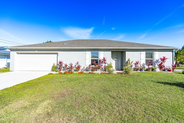 ranch-style house featuring a garage, concrete driveway, a front lawn, and stucco siding