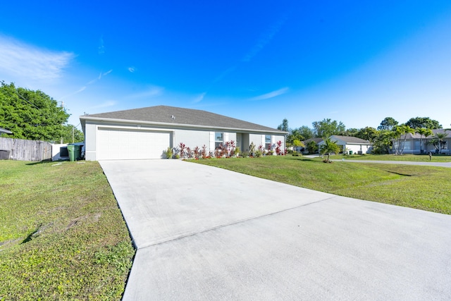 ranch-style home featuring a garage, concrete driveway, fence, a front yard, and stucco siding