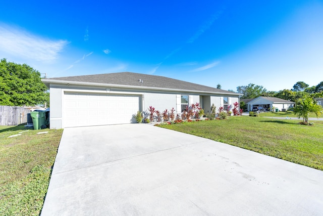 ranch-style home with an attached garage, fence, concrete driveway, stucco siding, and a front lawn