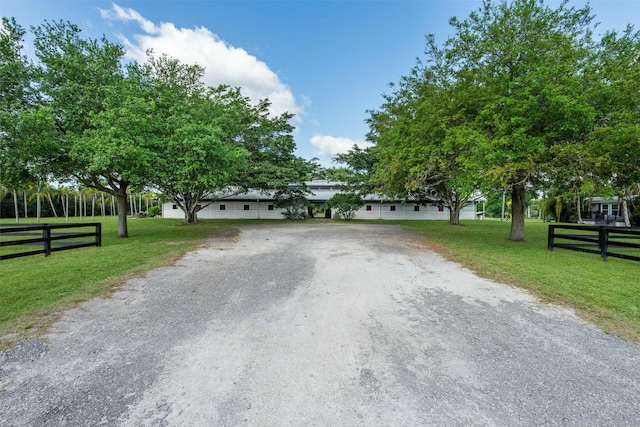 view of road with driveway