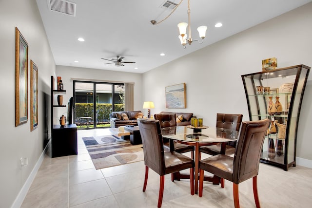 dining space with light tile patterned floors, visible vents, and recessed lighting