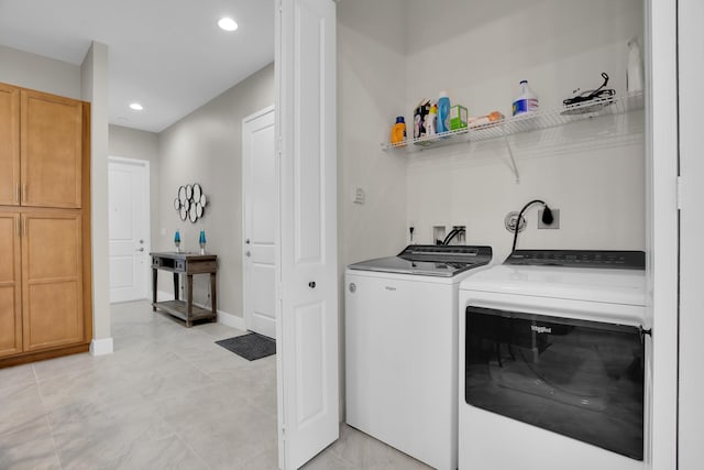 laundry room with laundry area, baseboards, separate washer and dryer, and recessed lighting