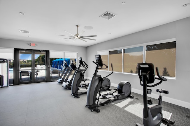 workout area with ceiling fan, french doors, visible vents, and baseboards