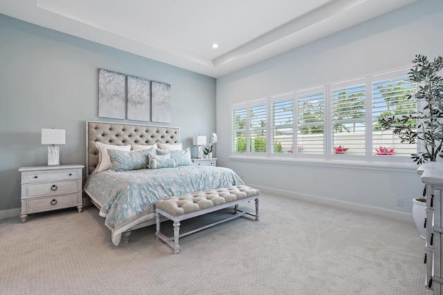 bedroom with recessed lighting, light colored carpet, and baseboards