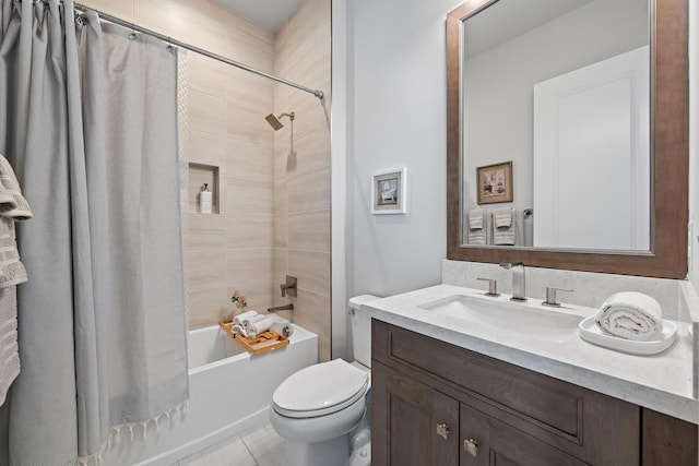 bathroom featuring shower / bath combo with shower curtain, toilet, and vanity