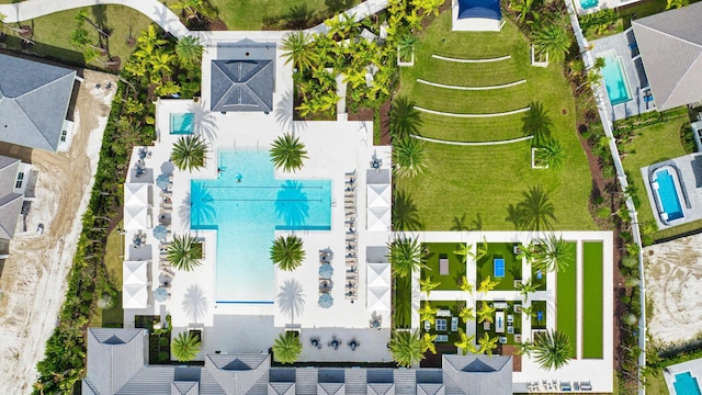 birds eye view of property with a residential view