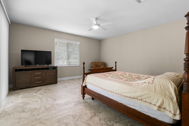 bedroom with visible vents, a ceiling fan, and baseboards