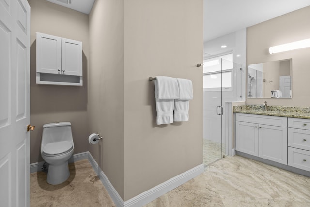 bathroom featuring baseboards, toilet, a shower stall, and vanity