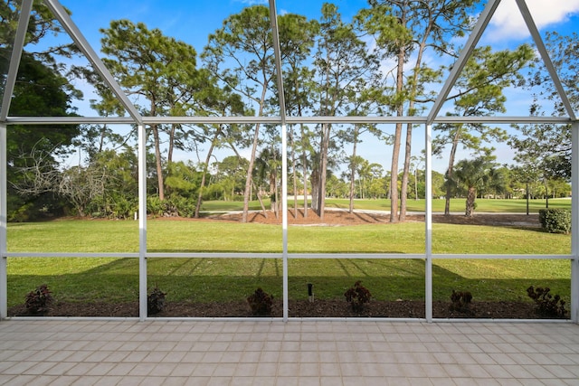 unfurnished sunroom featuring a wealth of natural light