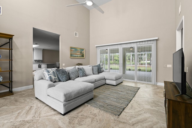 7250 Reserve Creek Dr, Port Saint Lucie, FL 34986 - living area featuring a high ceiling and ceiling fan