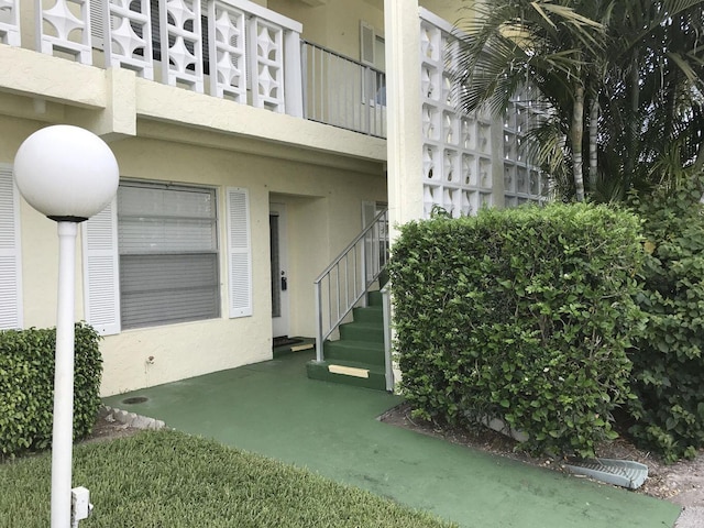 exterior space with stucco siding