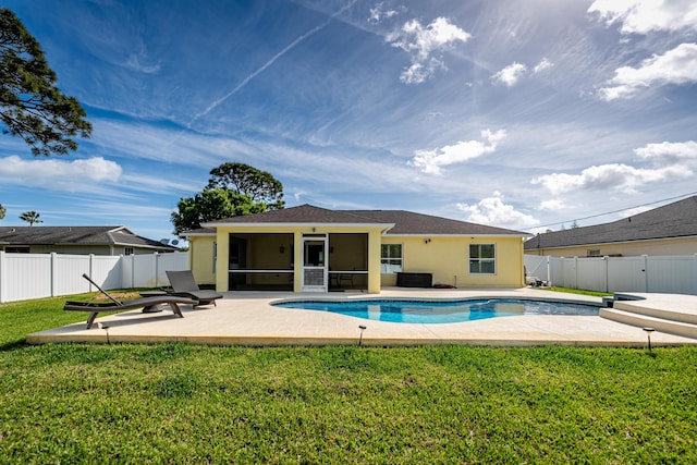 view of pool featuring a patio area, a fenced backyard, a sunroom, and a yard