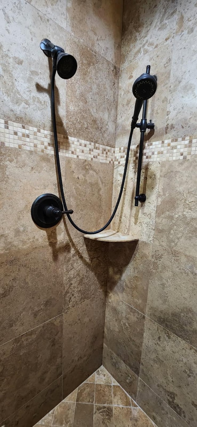 details with a tile shower