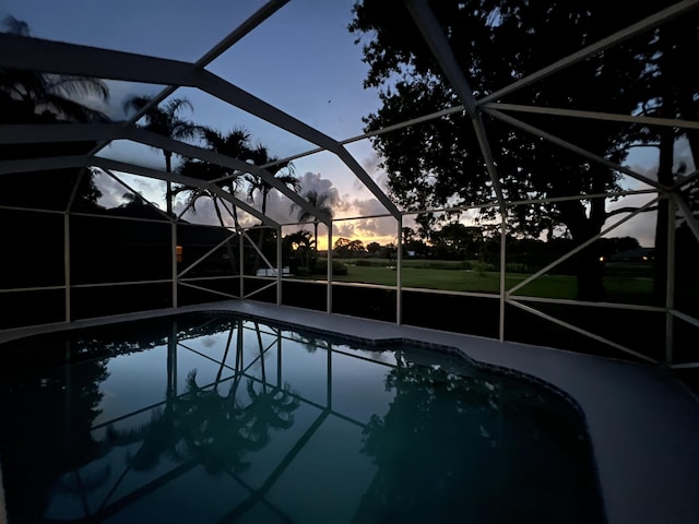 pool featuring a lanai and a patio