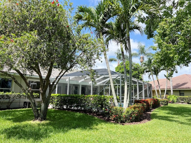 view of yard featuring a lanai