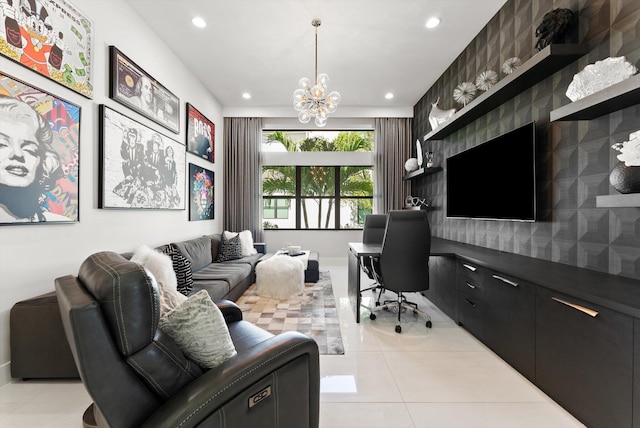 home office featuring built in desk, recessed lighting, an accent wall, a chandelier, and wallpapered walls