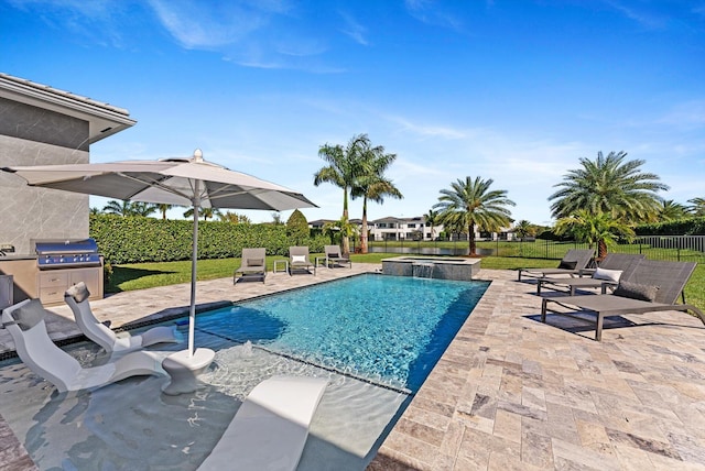 view of swimming pool with a patio area, a fenced backyard, a pool with connected hot tub, and a grill