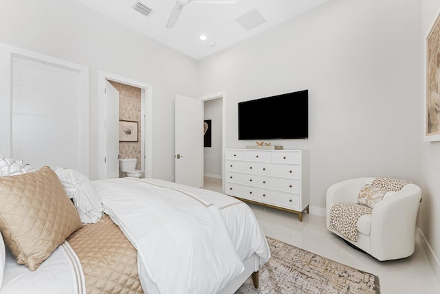 tiled bedroom featuring visible vents, ceiling fan, baseboards, and ensuite bathroom