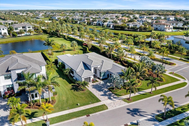 aerial view with a water view and a residential view