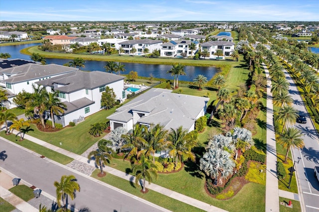 aerial view with a water view and a residential view