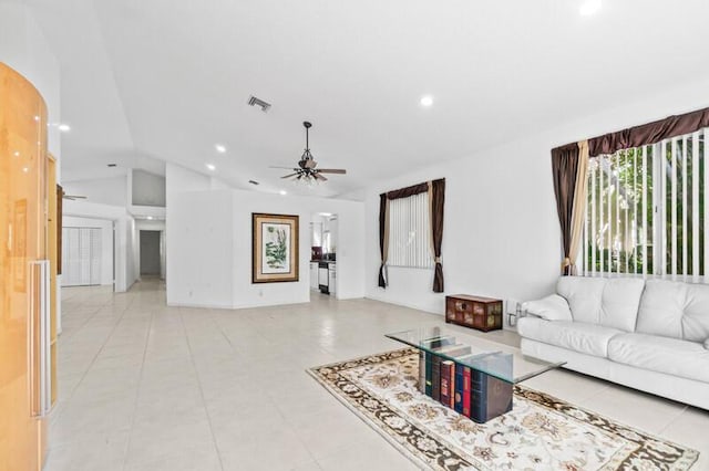 living room featuring lofted ceiling, recessed lighting, visible vents, a ceiling fan, and light tile patterned flooring