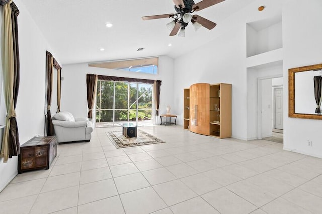 tiled living room with high vaulted ceiling, recessed lighting, visible vents, and ceiling fan