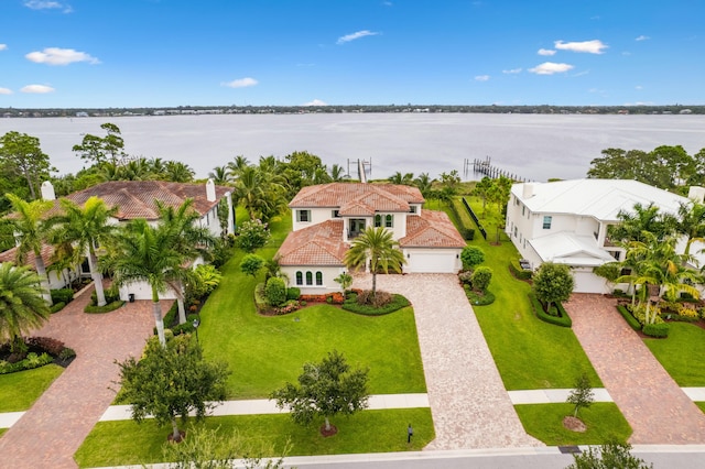 birds eye view of property featuring a water view