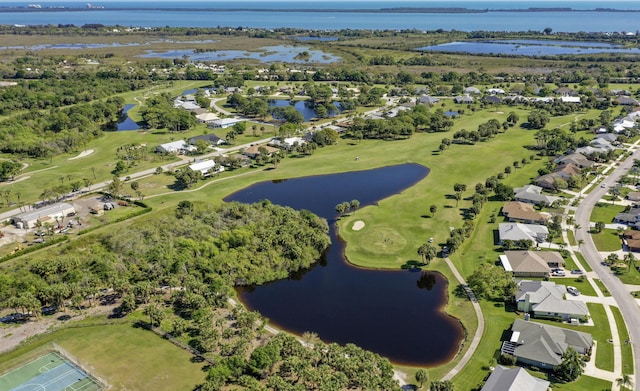 birds eye view of property featuring a residential view and a water view